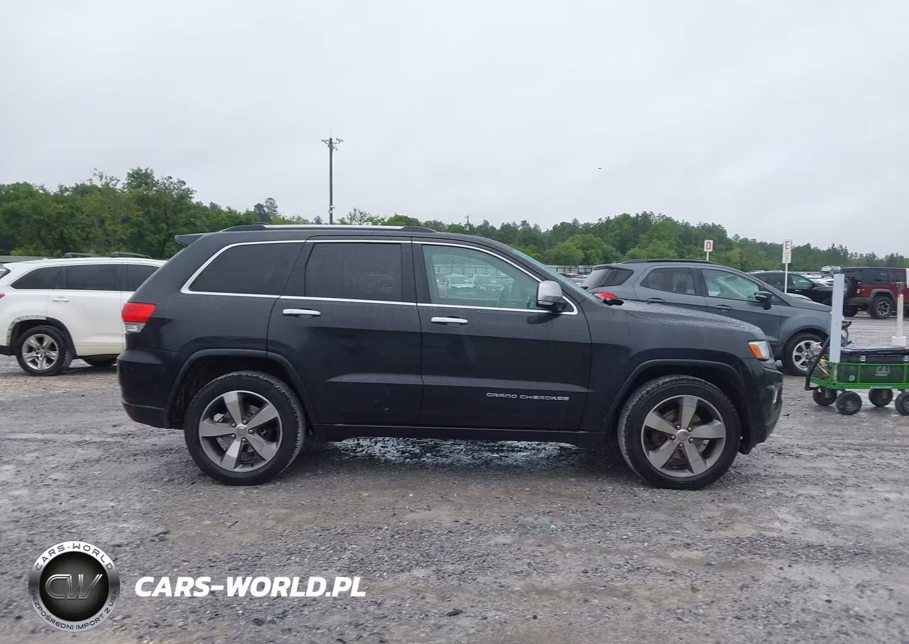 2015 Jeep Grand Cherokee Overland VIN:1C4RJECG1FC734860 - 13