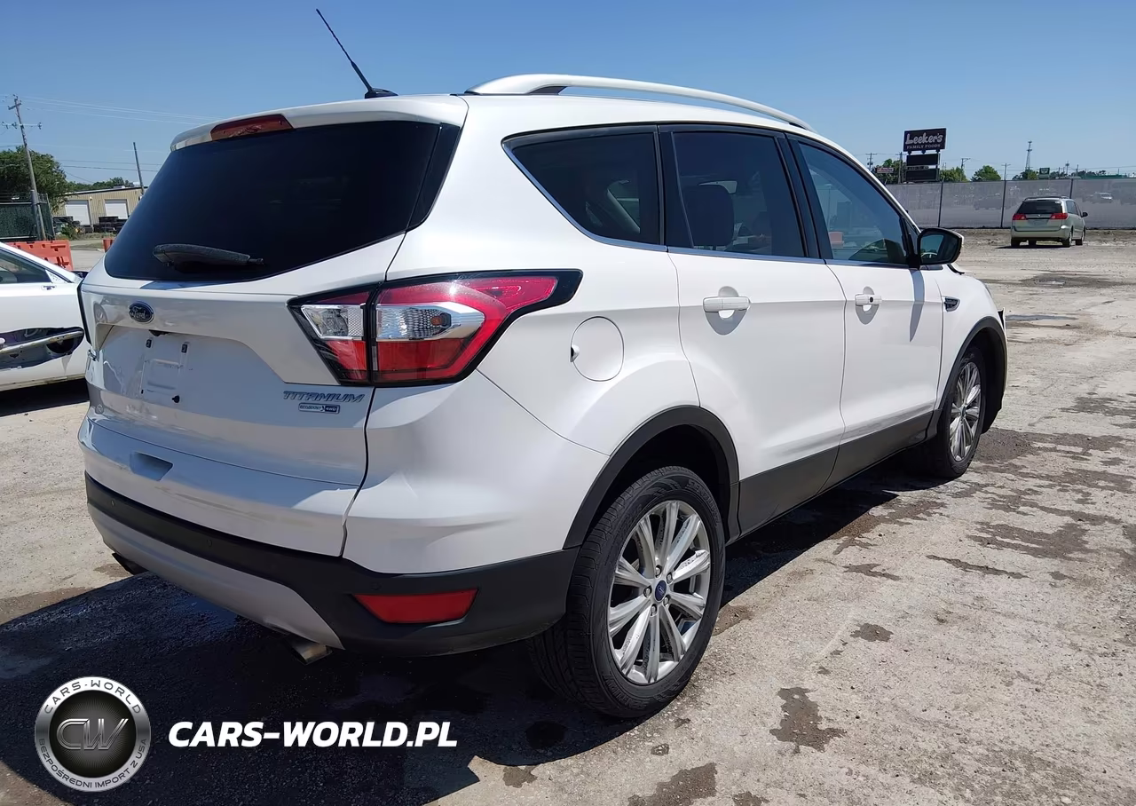 2017 Ford Escape Titanium VIN:1FMCU9J90HUE95142 - 4