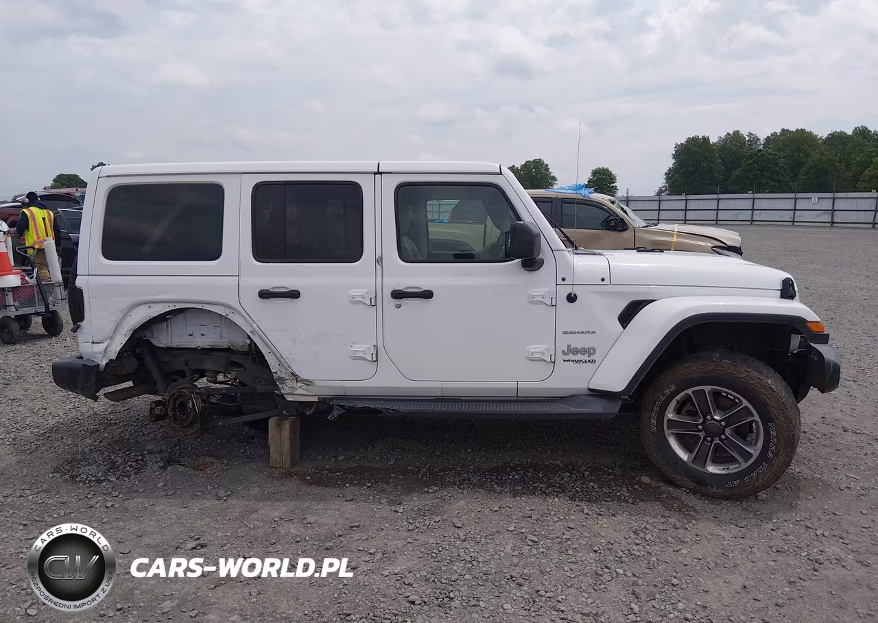 2019 Jeep Wrangler Unlimited Sahara 4X4 VIN:1C4HJXEG2KW548869 - 14