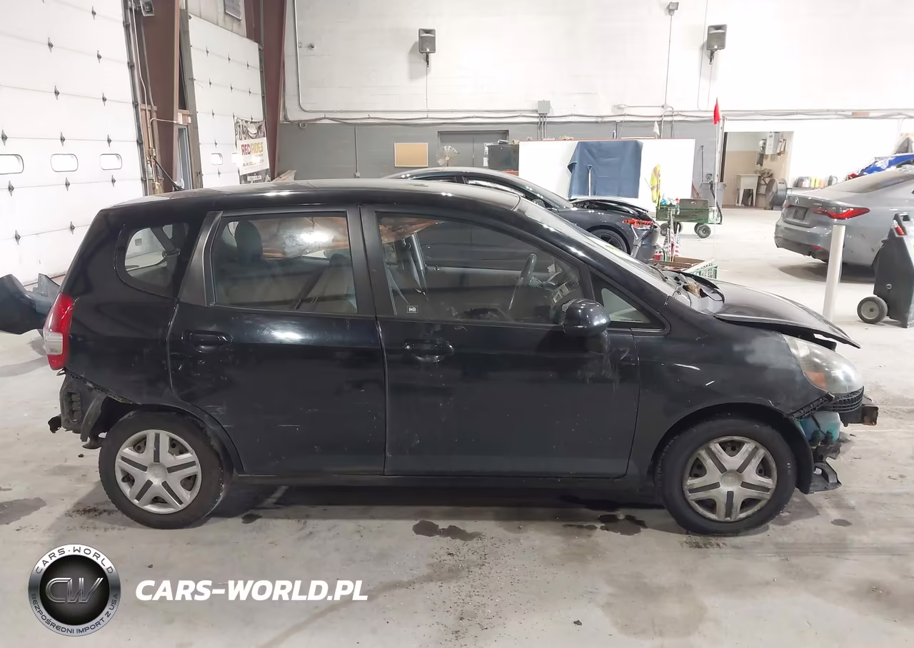2007 Honda Fit VIN:JHMGD38437S011311 - 13
