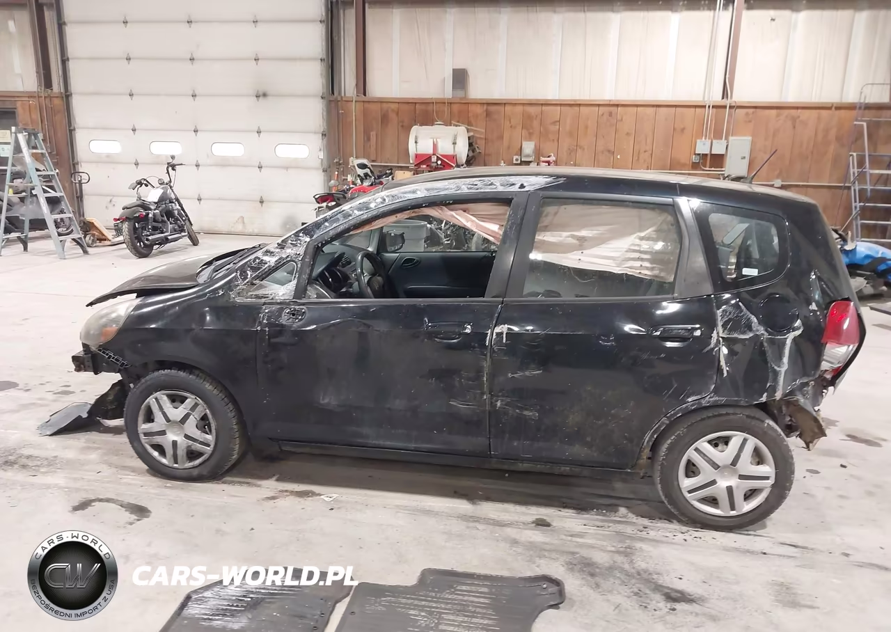 2007 Honda Fit VIN:JHMGD38437S011311 - 14