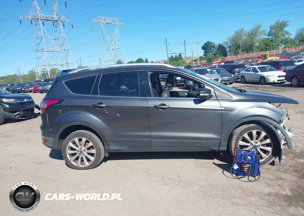 2017 Ford Escape Titanium VIN:1FMCU9J96HUC99173 - 14