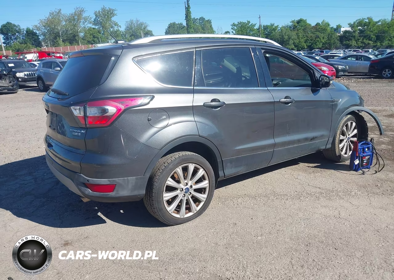 2017 Ford Escape Titanium VIN:1FMCU9J96HUC99173 - 4