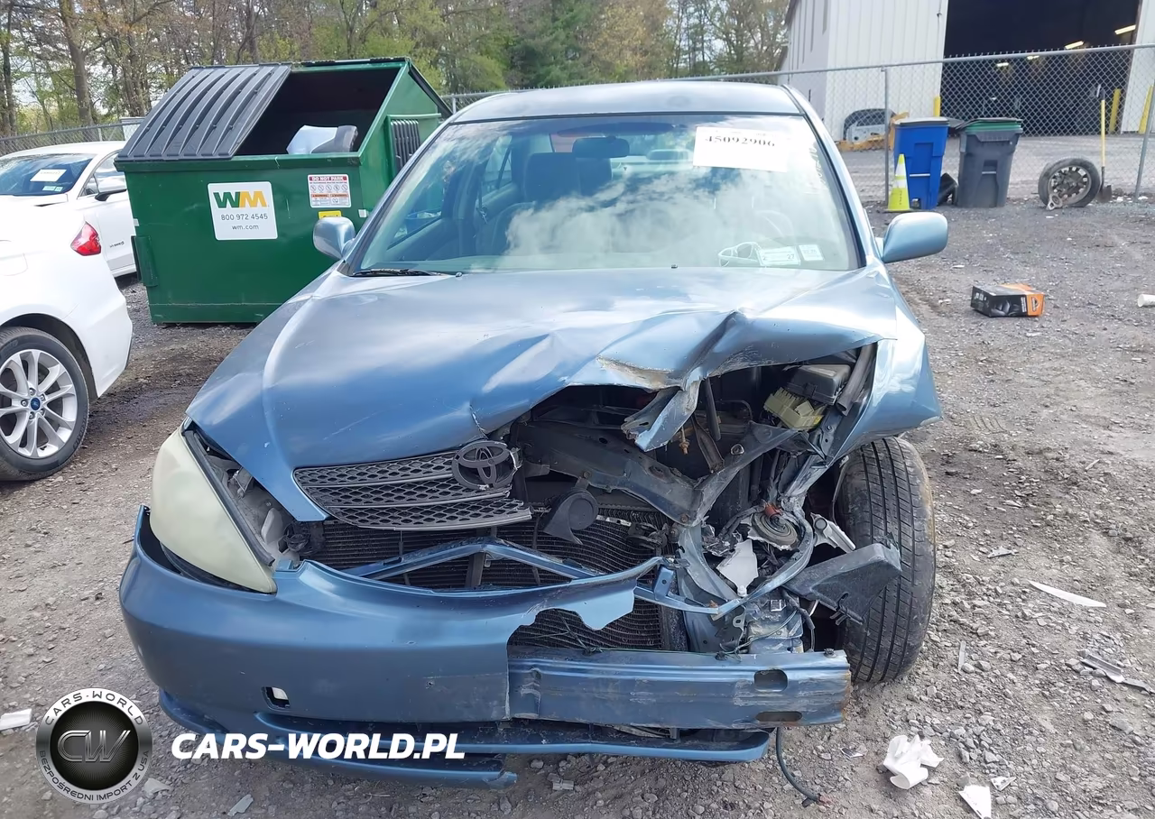 2002 Toyota Camry Le VIN:JTDBE32K520020712 - 12