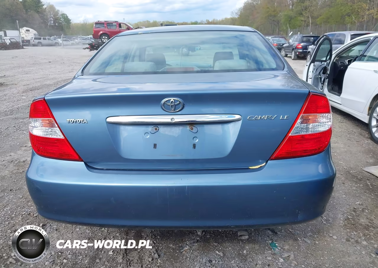 2002 Toyota Camry Le VIN:JTDBE32K520020712 - 16