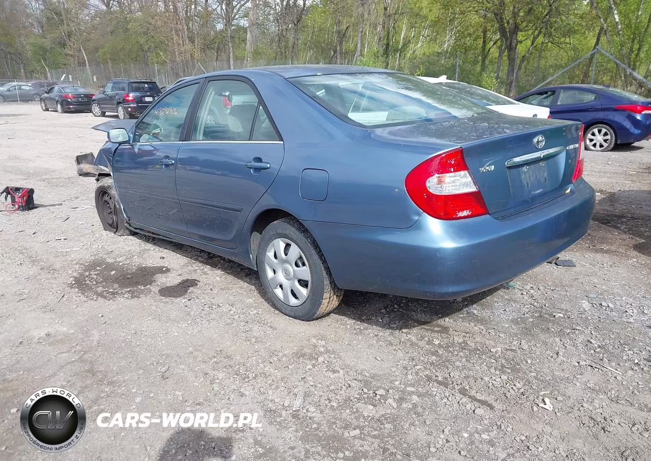 2002 Toyota Camry Le VIN:JTDBE32K520020712 - 3