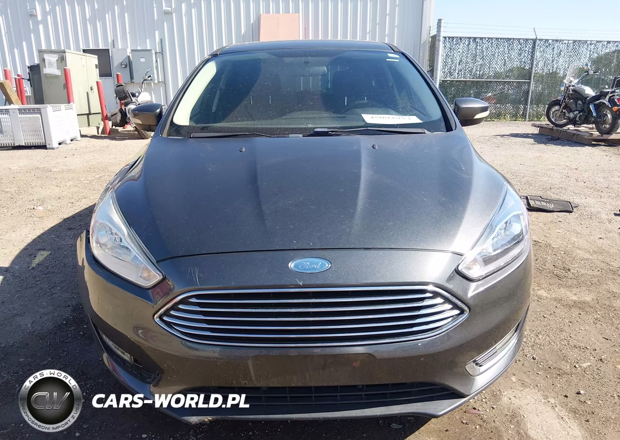 2015 Ford Focus Titanium VIN:1FADP3N21FL328257 - 12