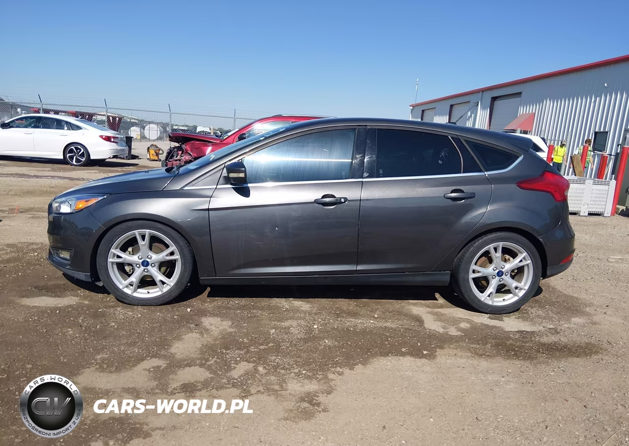 2015 Ford Focus Titanium VIN:1FADP3N21FL328257 - 14