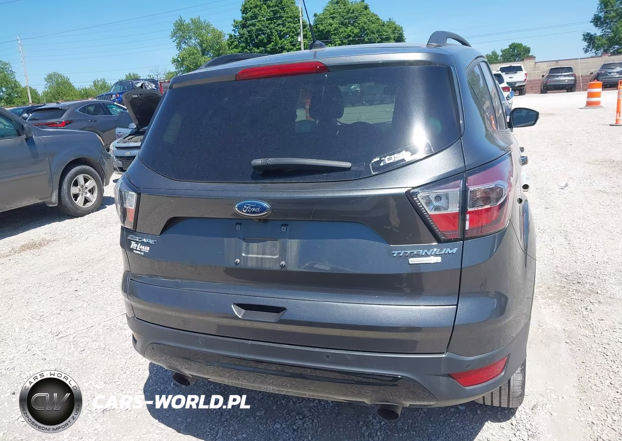 2017 Ford Escape Titanium VIN:1FMCU0J93HUC01213 - 16