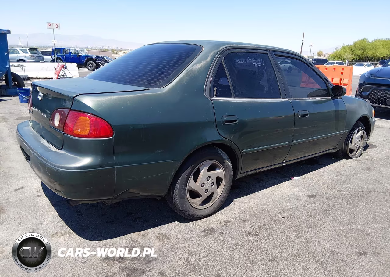 2001 Toyota Corolla Le VIN:1NXBR12E21Z549718 - 4