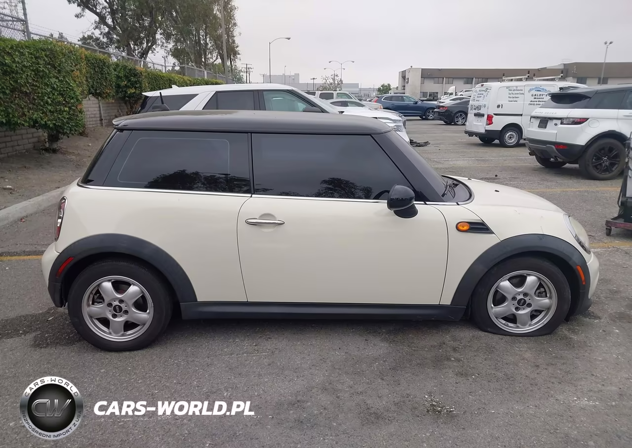 2011 Mini Cooper VIN:WMWSU3C5XBT099415 - 13