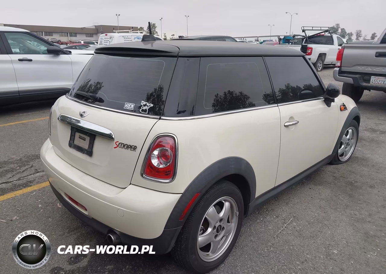 2011 Mini Cooper VIN:WMWSU3C5XBT099415 - 4
