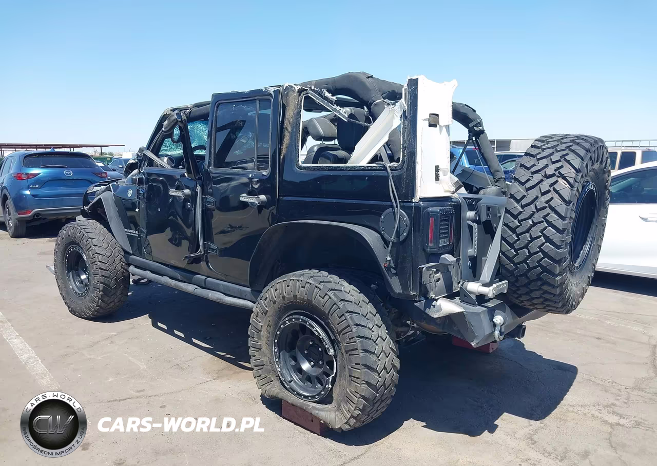 2015 Jeep Wrangler Unlimited Rubicon VIN:1C4HJWFG4FL682220 - 3