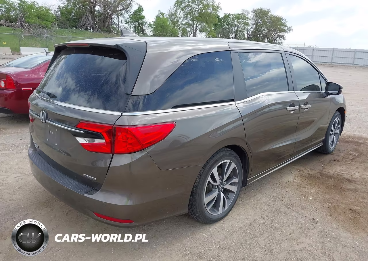 2023 Honda Odyssey Touring VIN:5FNRL6H88PB007981 - 4