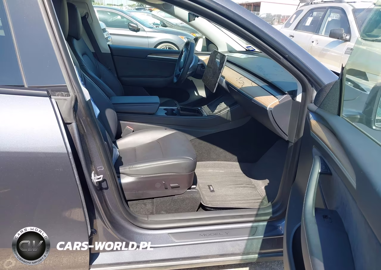 2023 Tesla Model Y Performance Dual Motor All-Wheel Drive VIN:7SAYGDEF5PF668944 - 5