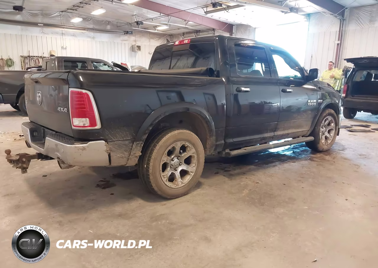 2015 Ram 1500 Laramie VIN:1C6RR7NT4FS643013 - 4