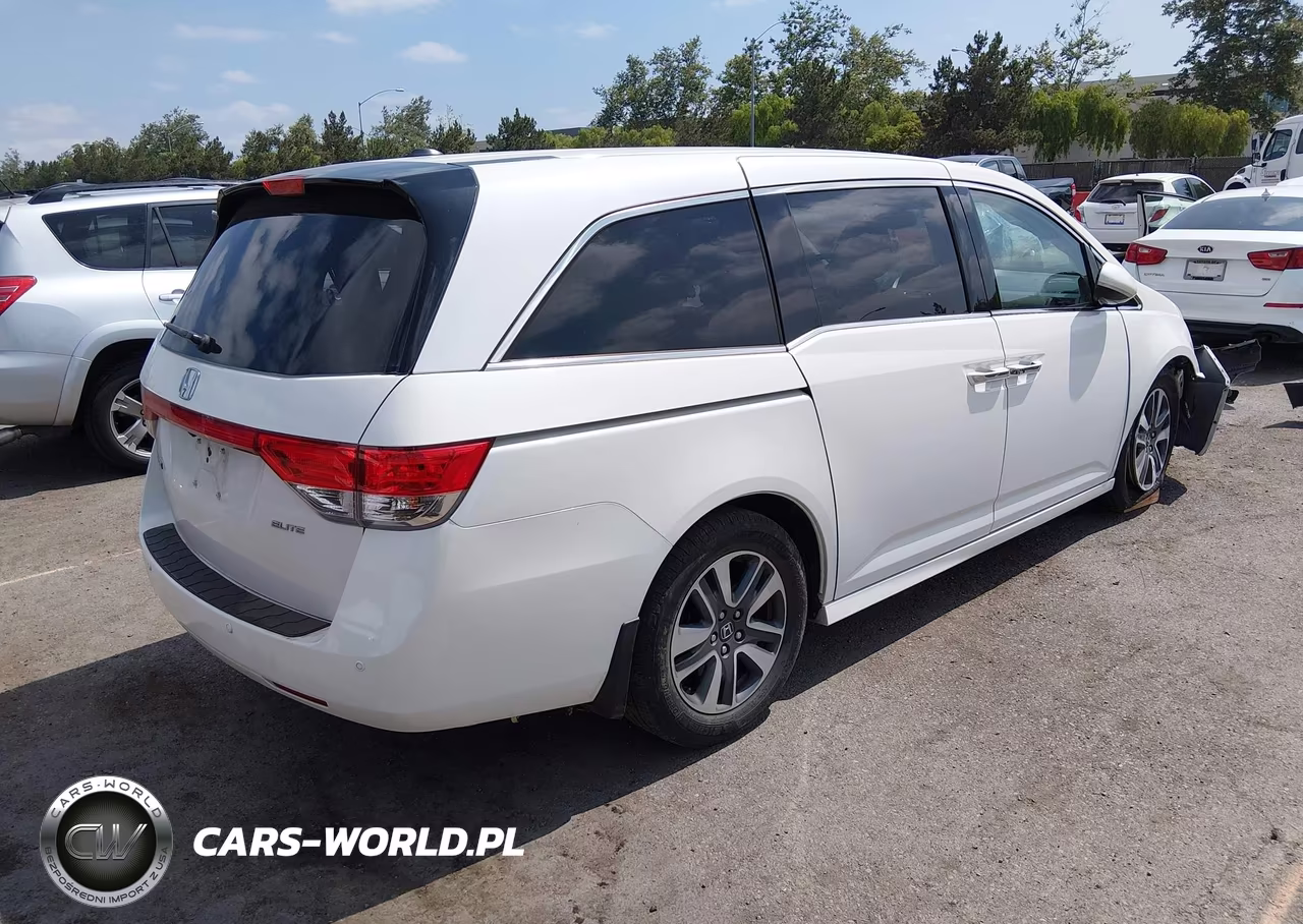2014 Honda Odyssey Touring-Touring Elite VIN:5FNRL5H94EB098960 - 4