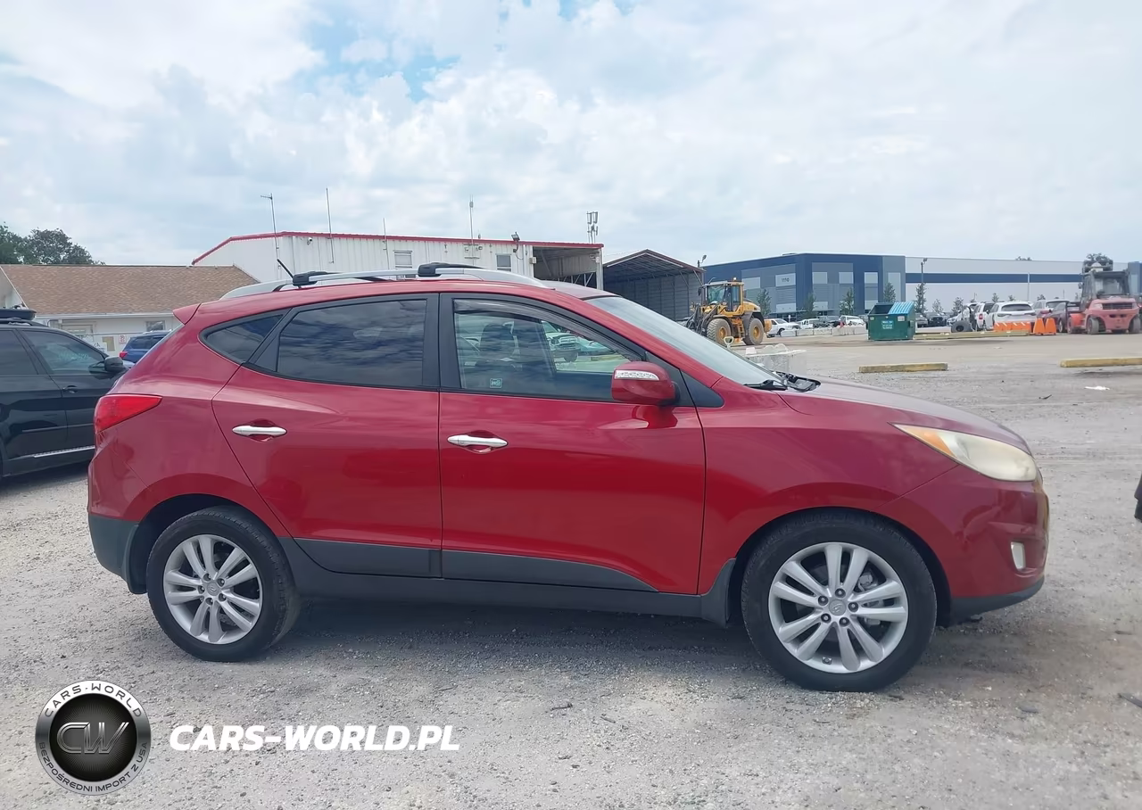2012 Hyundai Tucson Limited VIN:KM8JUCACXCU534215 - 13