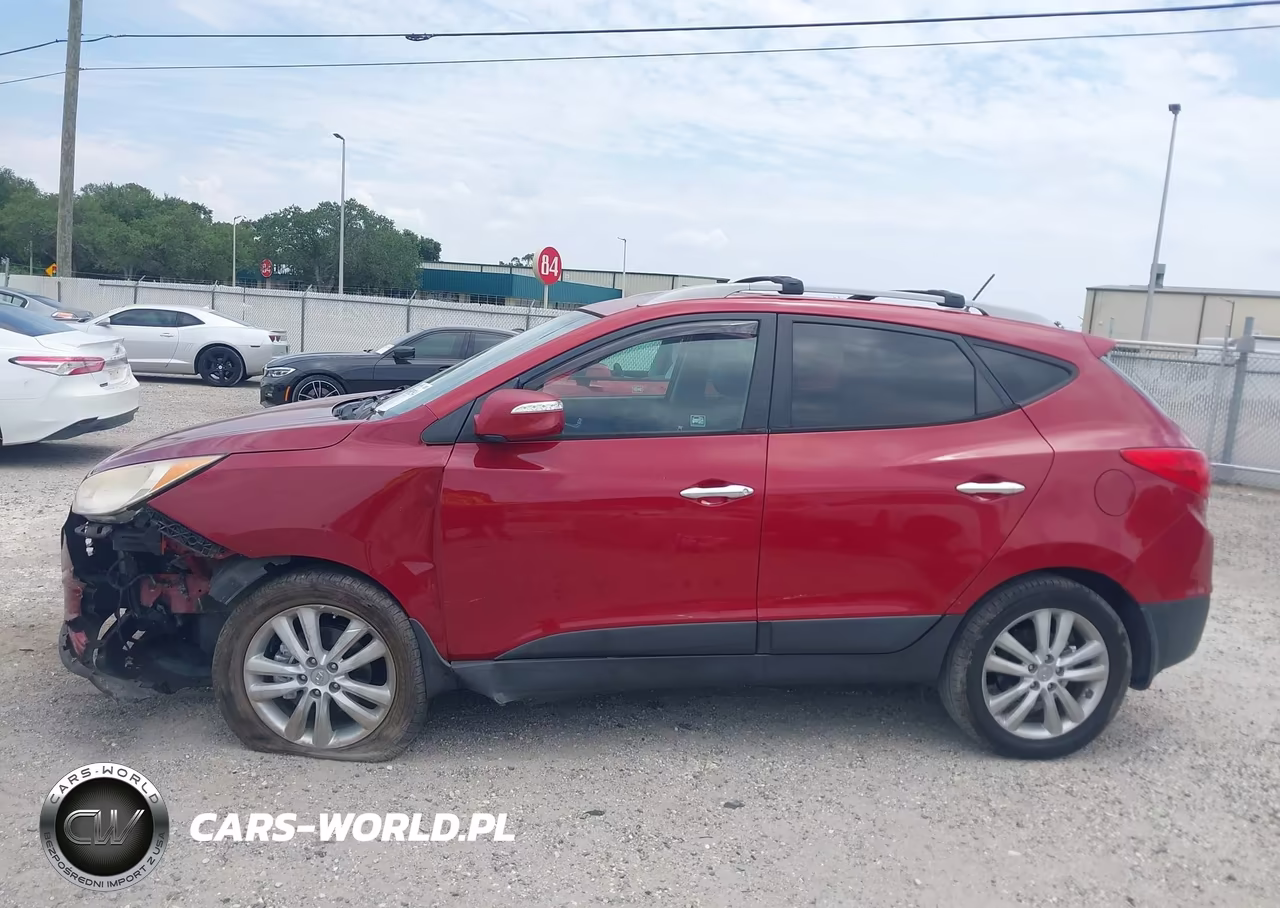 2012 Hyundai Tucson Limited VIN:KM8JUCACXCU534215 - 14