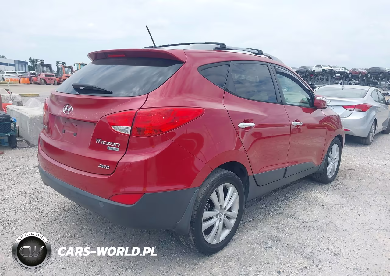 2012 Hyundai Tucson Limited VIN:KM8JUCACXCU534215 - 4