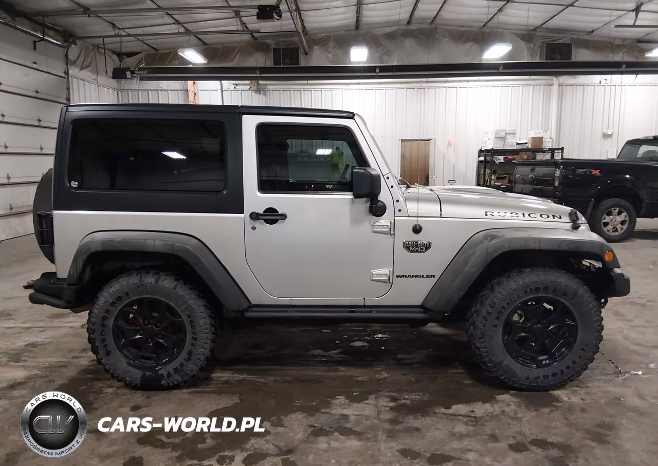 2012 Jeep Wrangler Rubicon VIN:1C4HJWCG7CL226180 - 14