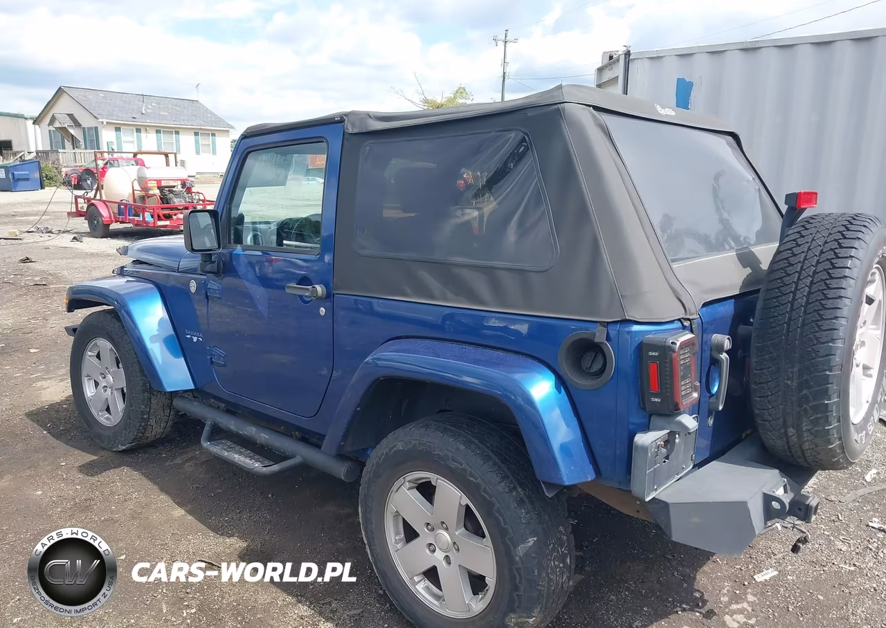 2010 Jeep Wrangler Sahara VIN:1J4GA5D10AL110326 - 3