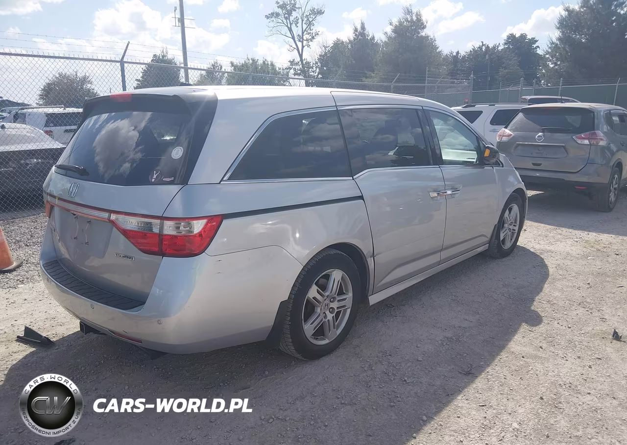 2012 Honda Odyssey Touring-Touring Elite VIN:5FNRL5H91CB141471 - 4