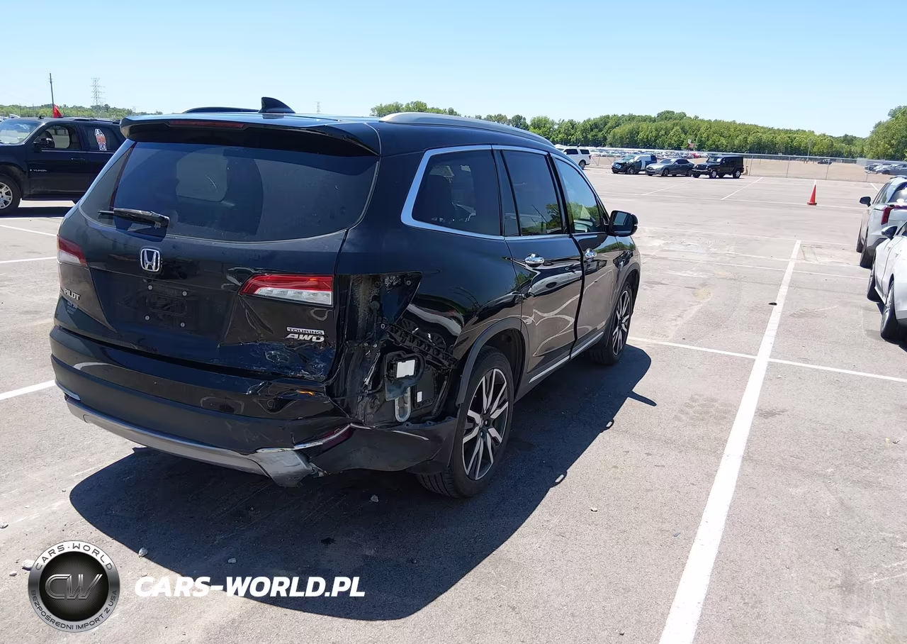 2019 Honda Pilot Touring VIN:5FNYF6H97KB064693 - 4