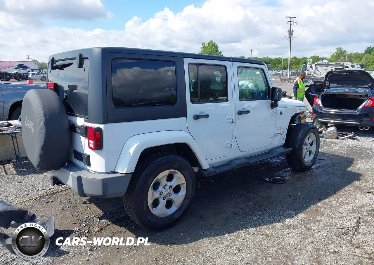 2014 Jeep Wrangler Unlimited Sahara VIN:1C4BJWEG0EL228665 - 4