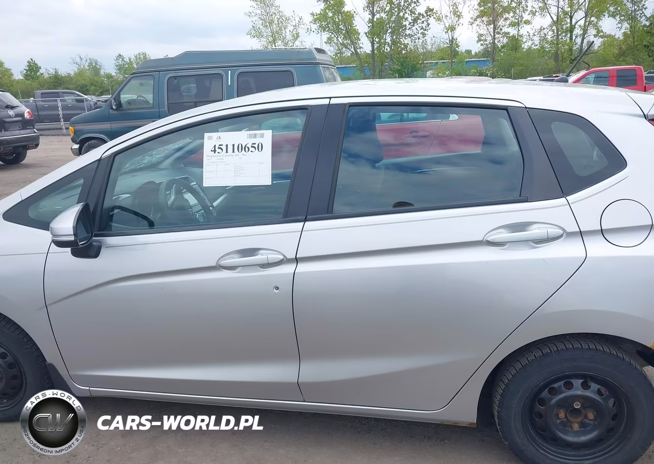 2015 Honda Fit Lx VIN:3HGGK5H59FM785129 - 14