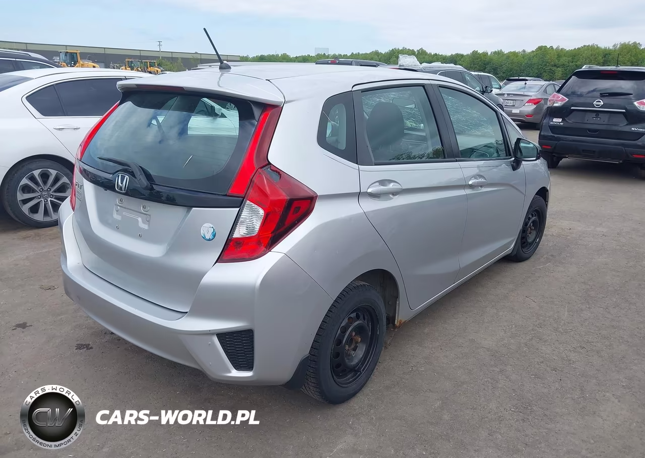 2015 Honda Fit Lx VIN:3HGGK5H59FM785129 - 4