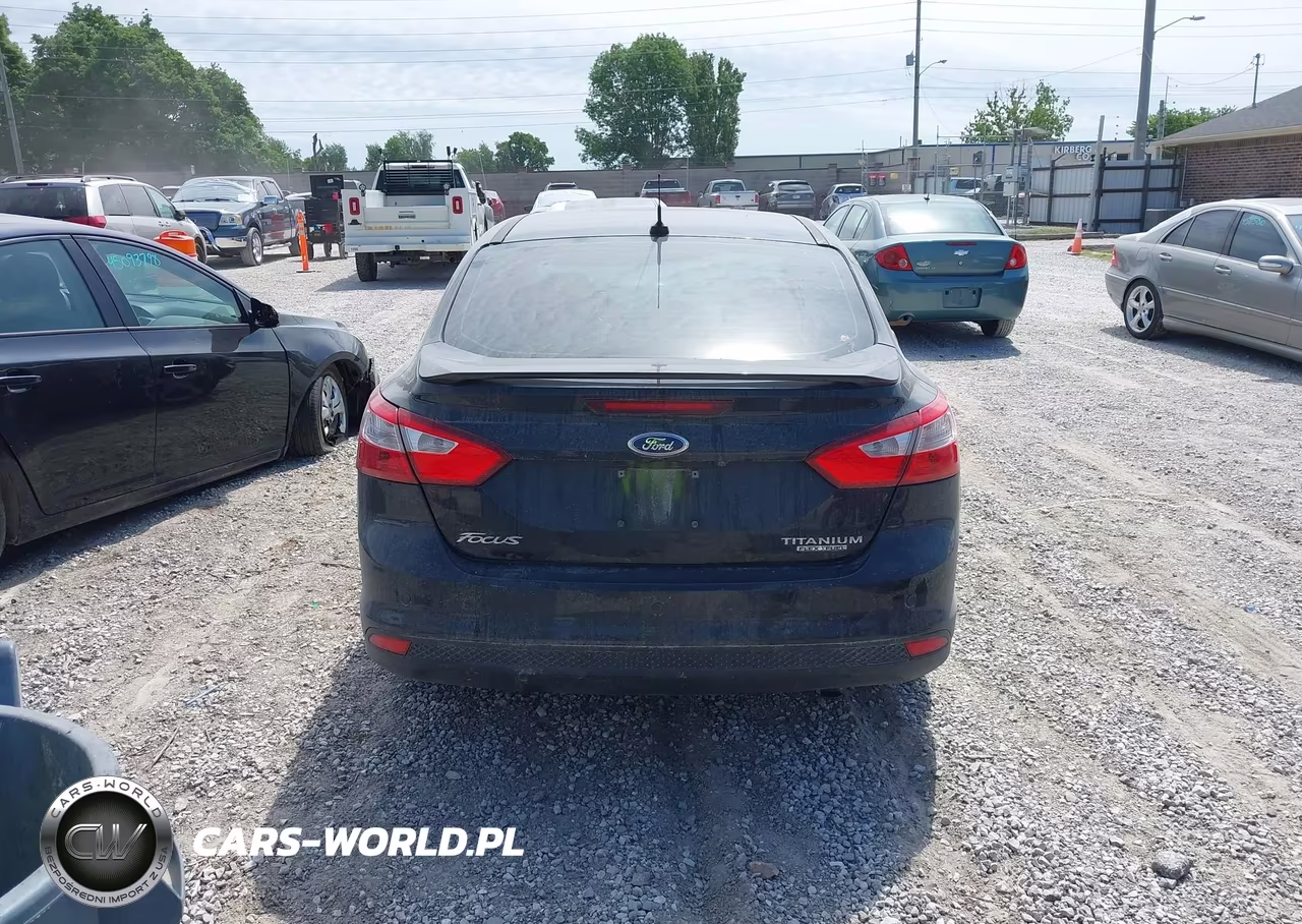 2013 Ford Focus Titanium VIN:1FADP3J29DL151069 - 17