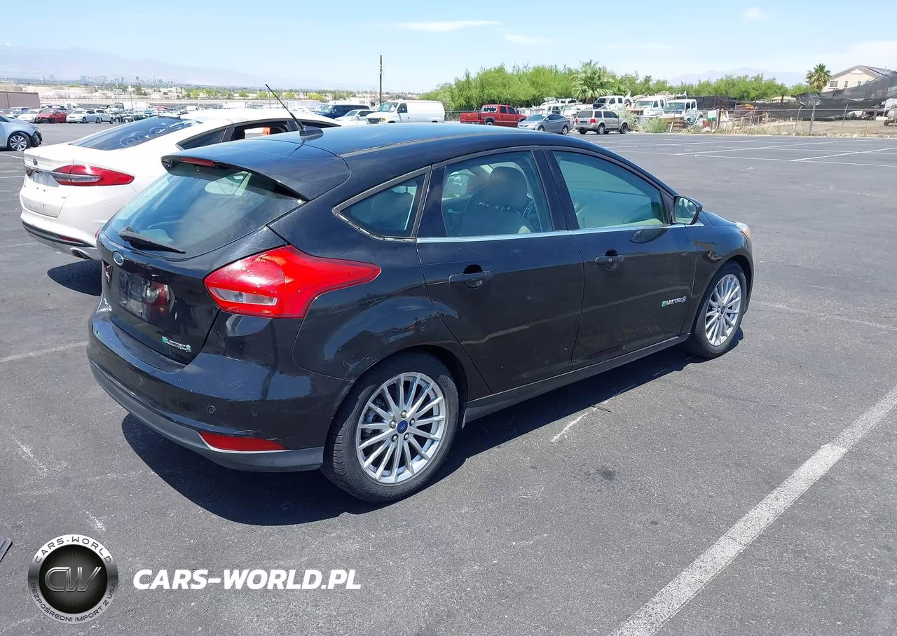 2015 Ford Focus Electric VIN:1FADP3R47FL275351 - 4
