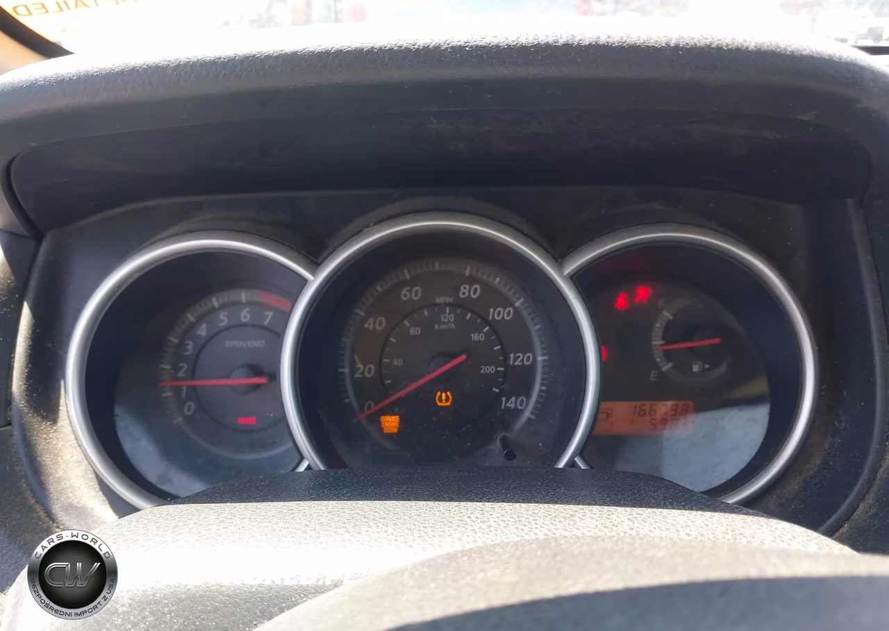 2010 Nissan Versa 1.6 VIN:3N1CC1AP9AL418151 - 7