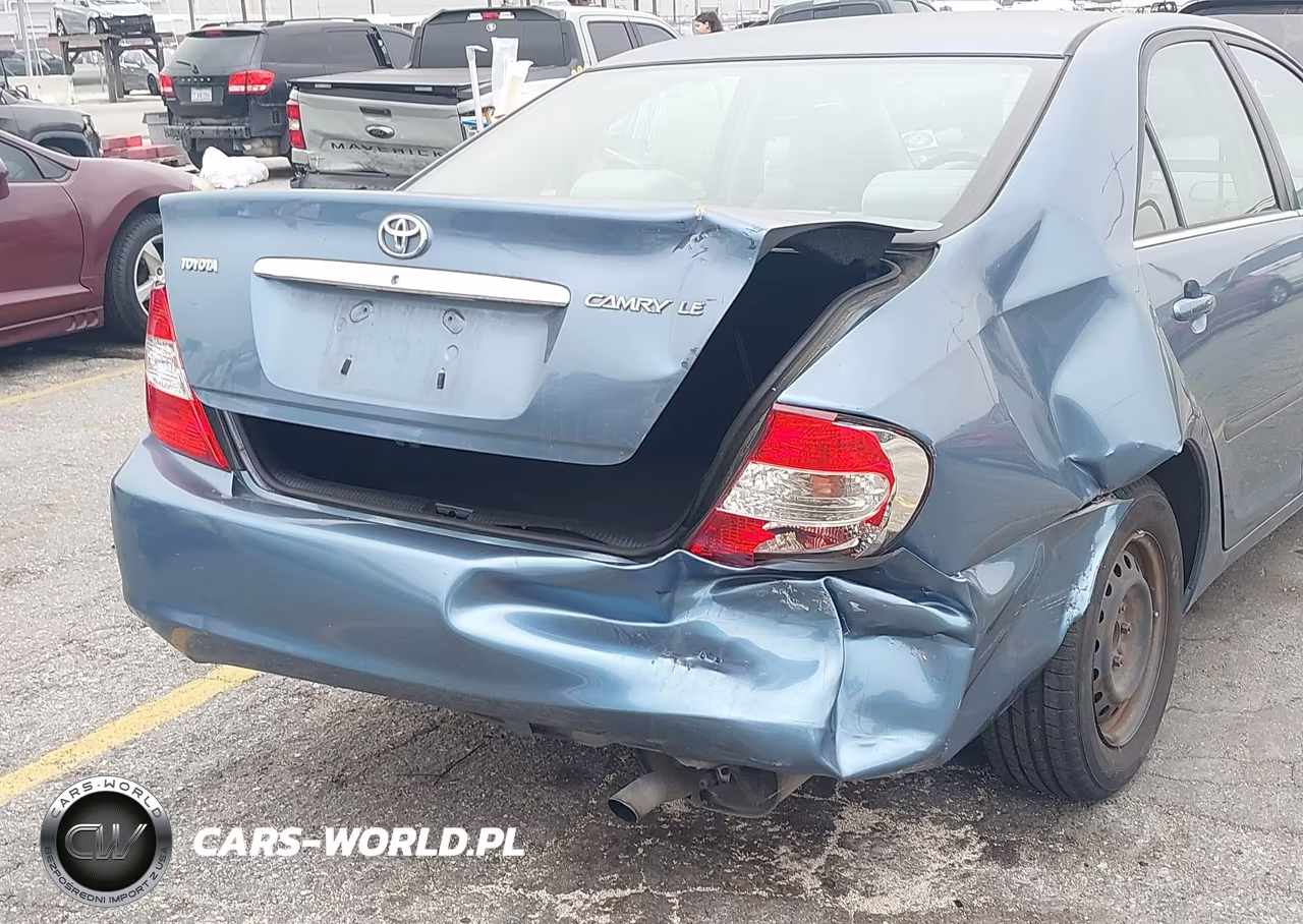 2004 Toyota Camry Le VIN:JTDBE32K040268904 - 12