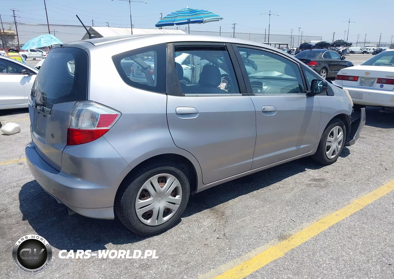 2009 Honda Fit VIN:JHMGE87299S065287 - 4