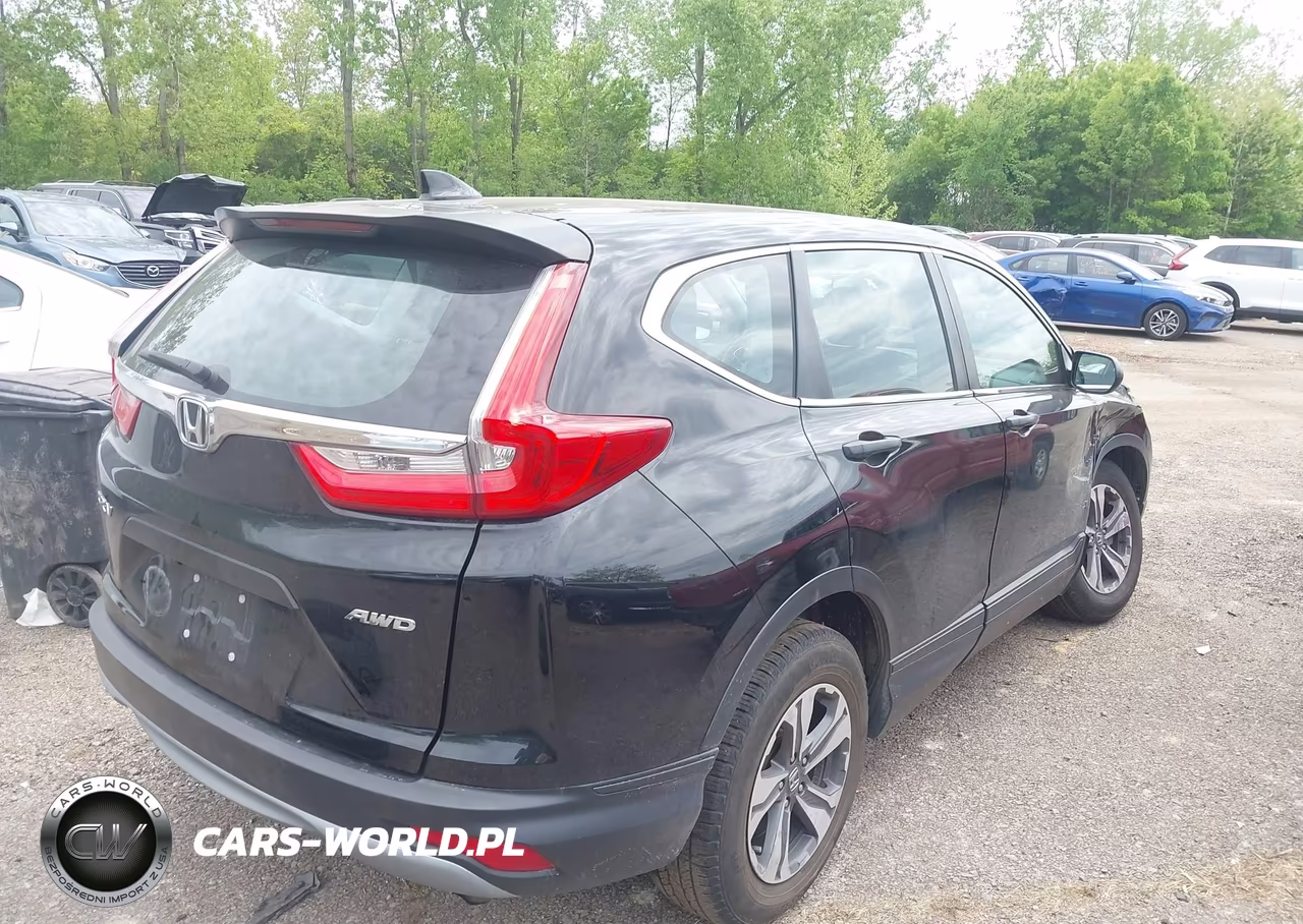 2018 Honda Cr-V Lx VIN:2HKRW6H30JH211940 - 4