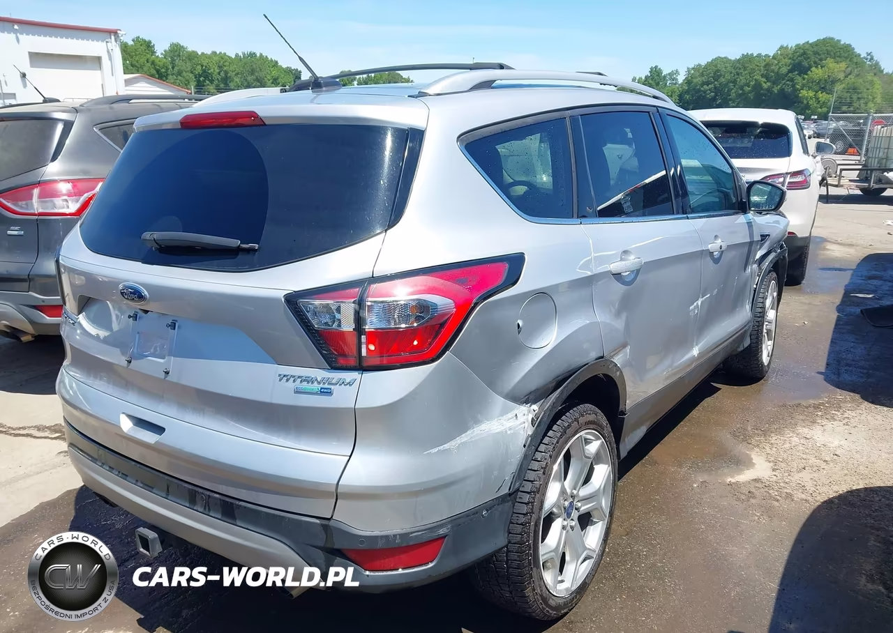 2017 Ford Escape Titanium VIN:1FMCU9J91HUE02502 - 4