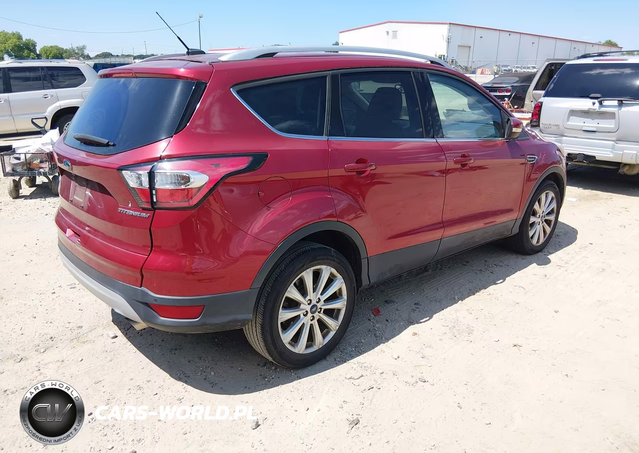 2017 Ford Escape Titanium VIN:1FMCU0J92HUD34013 - 4