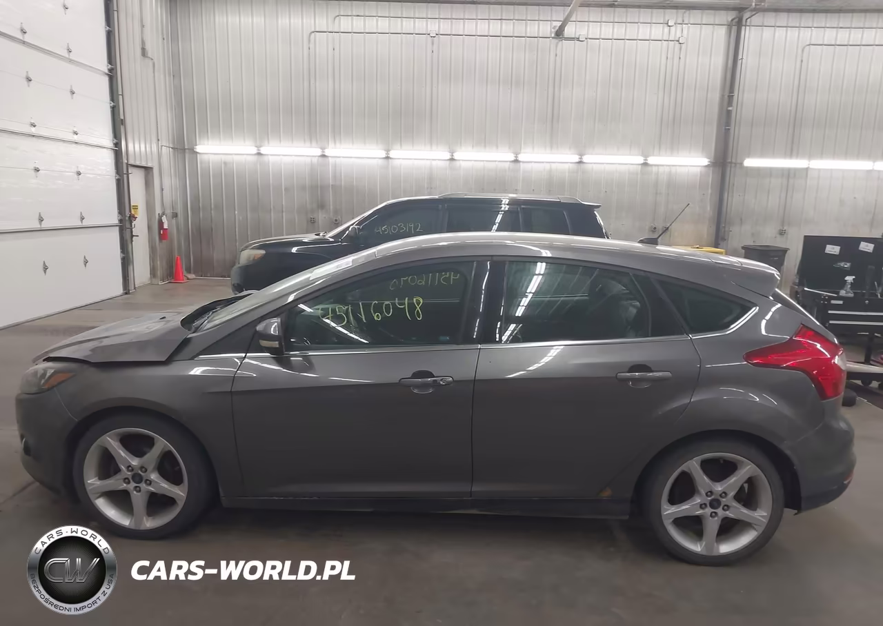 2013 Ford Focus Titanium VIN:1FADP3N21DL184268 - 15