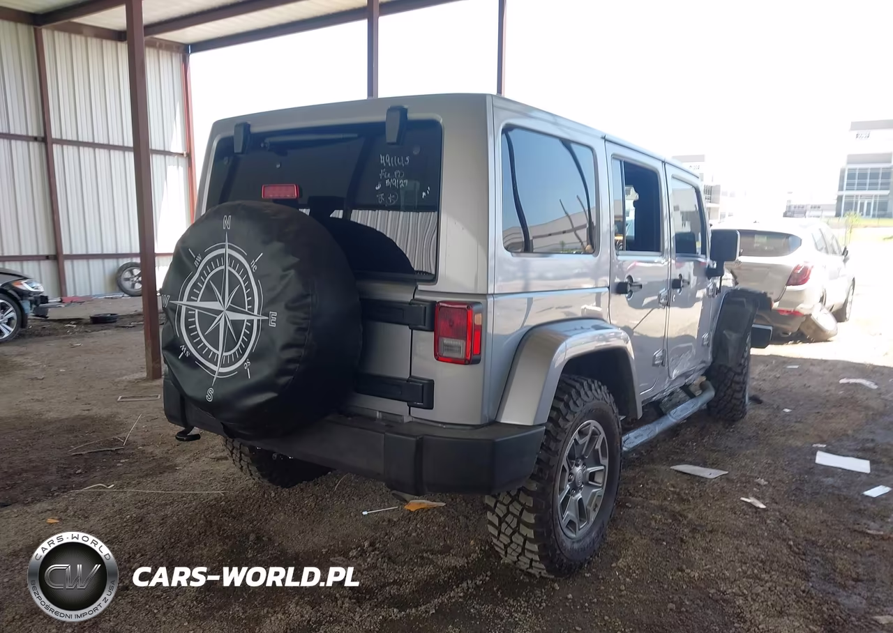 2015 Jeep Wrangler Unlimited Rubicon VIN:1C4BJWFGXFL684026 - 4