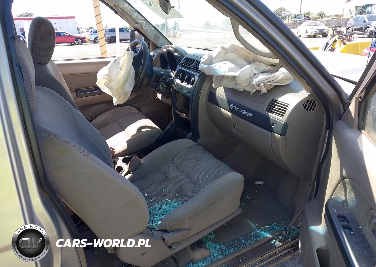2004 Nissan Frontier Xe VIN:1N6DD26T04C403805 - 5