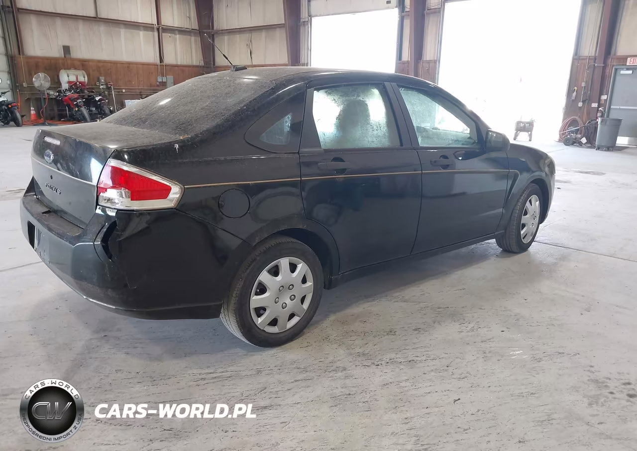 2009 Ford Focus S VIN:1FAHP34N49W210283 - 4