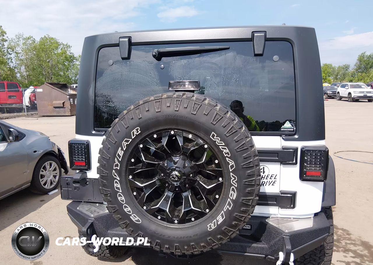 2014 Jeep Wrangler Willys Wheeler VIN:1C4AJWAG2EL253939 - 16