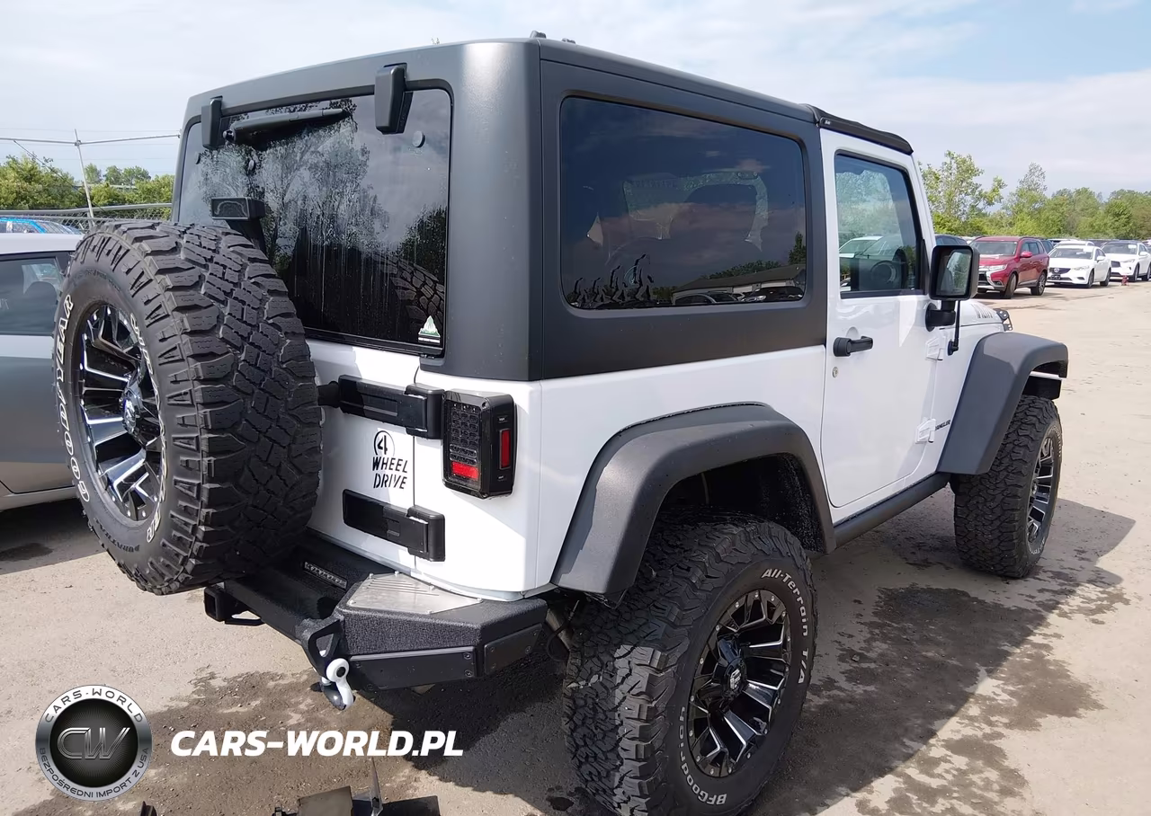 2014 Jeep Wrangler Willys Wheeler VIN:1C4AJWAG2EL253939 - 4