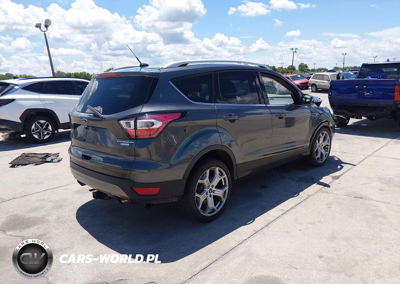 2017 Ford Escape Titanium VIN:1FMCU0JD5HUB99002 - 4