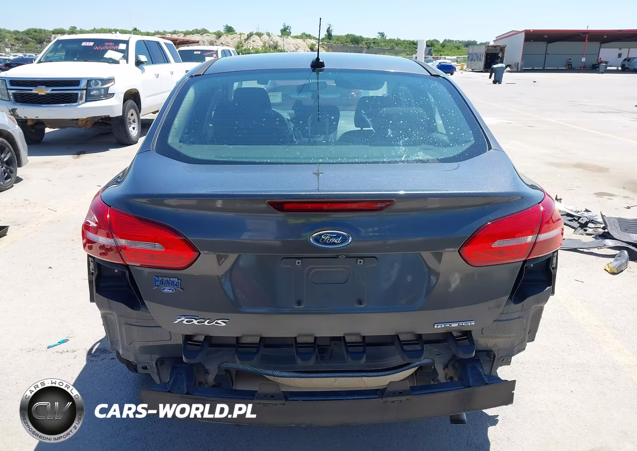 2016 Ford Focus S VIN:1FADP3E21GL359994 - 17