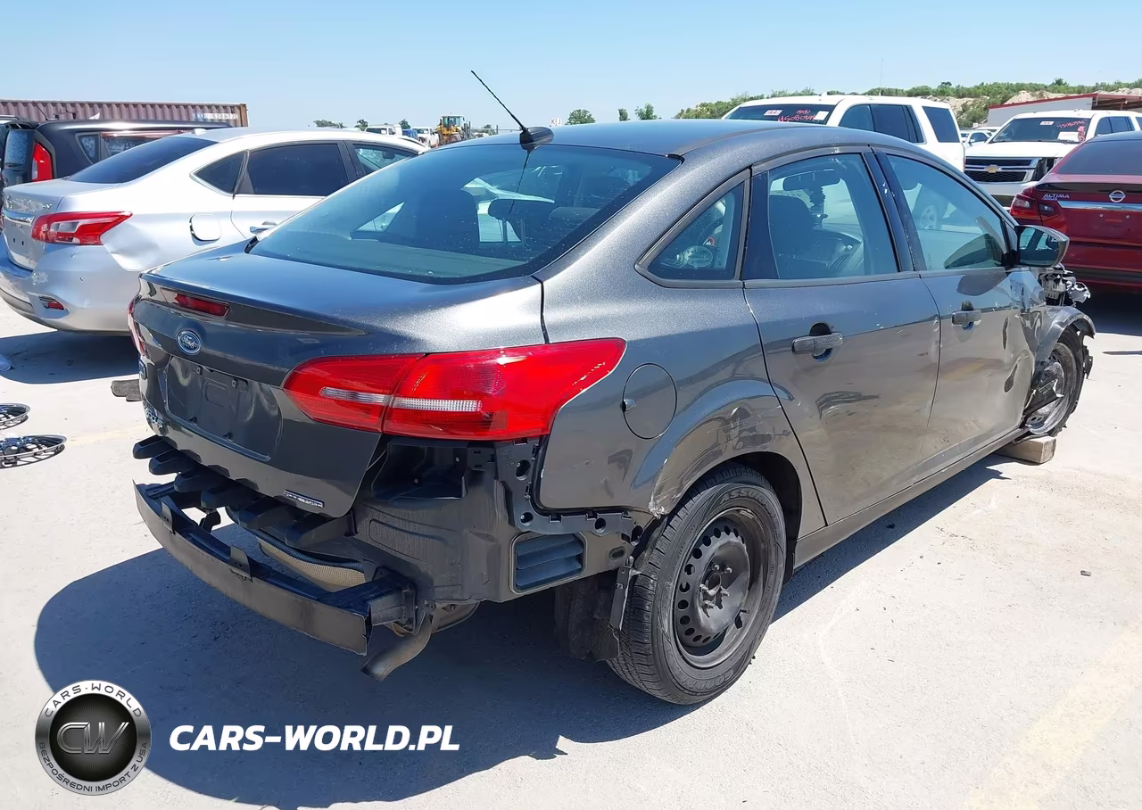 2016 Ford Focus S VIN:1FADP3E21GL359994 - 4