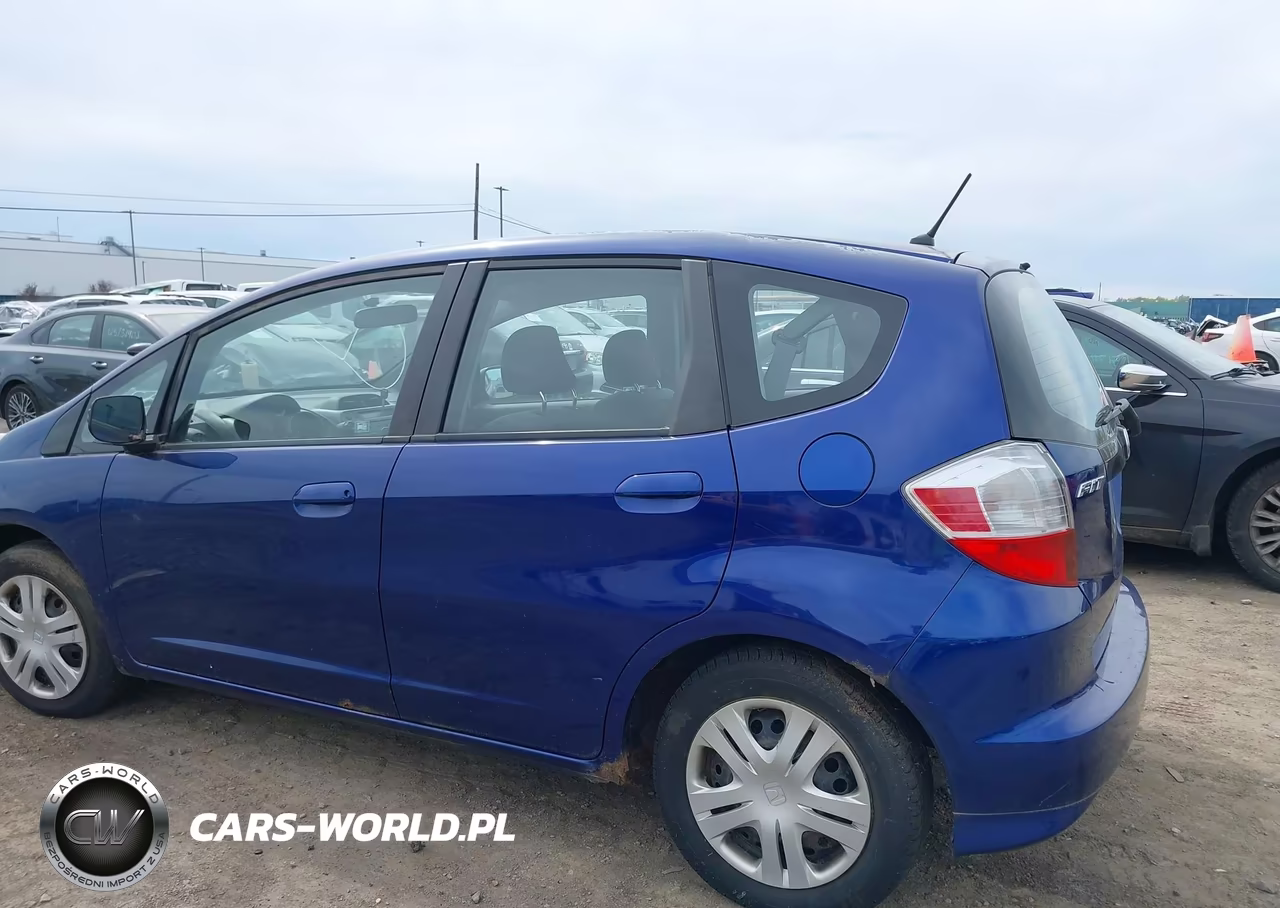 2009 Honda Fit VIN:JHMGE88269S018569 - 13