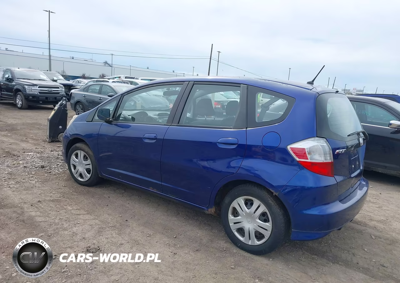 2009 Honda Fit VIN:JHMGE88269S018569 - 3
